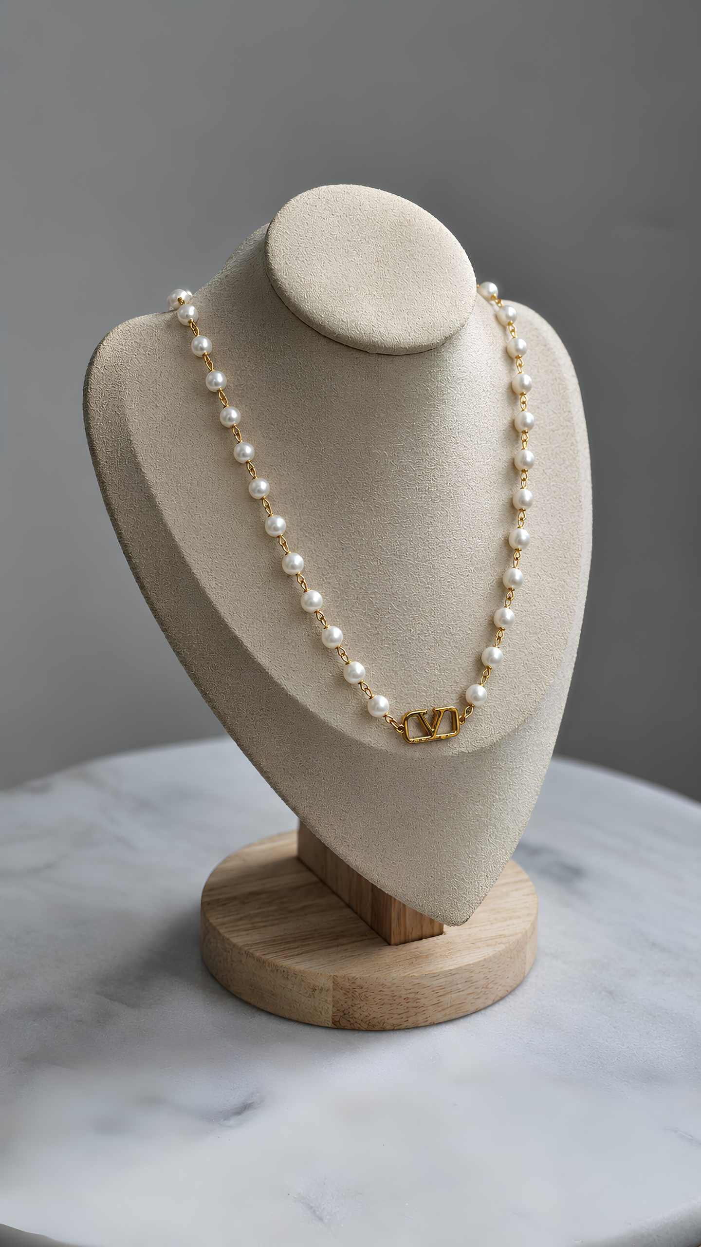 The Luxe Pearl V-Emblem Chain